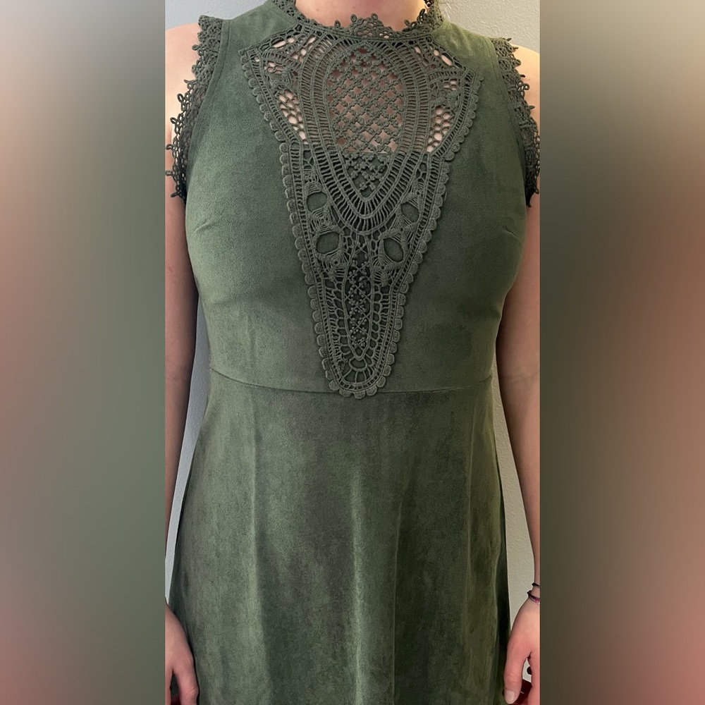 Francesca’s dark green dress